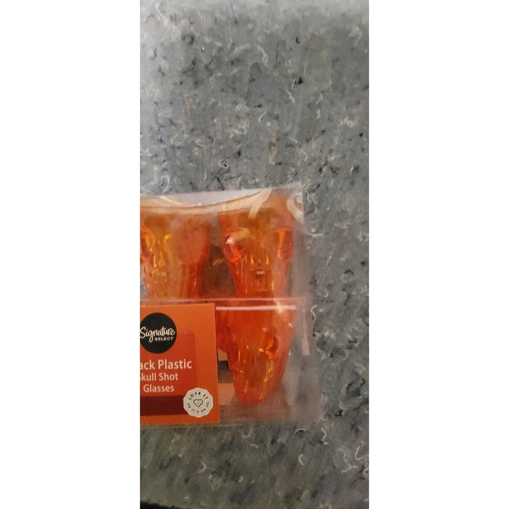 Holiday Skull‎ Plastic Orange Shot Glasses 4 per pack